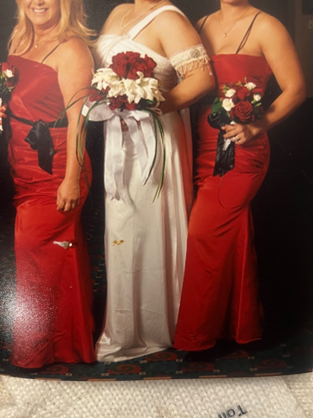 Grecian Style white satin wedding dress.